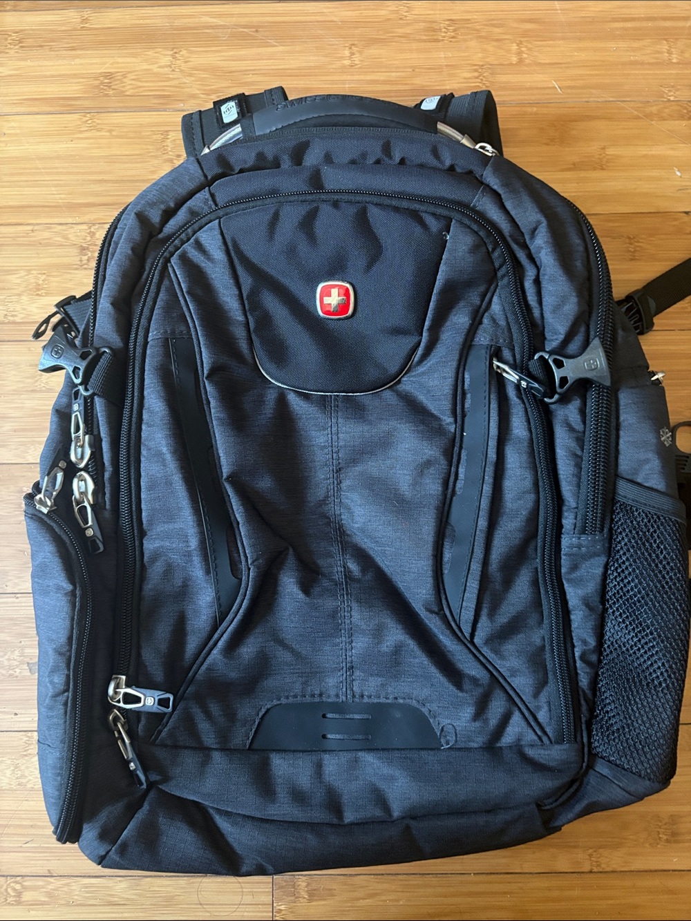 SwissGear Black Men's Laptop Backpack with Red Logo Accent